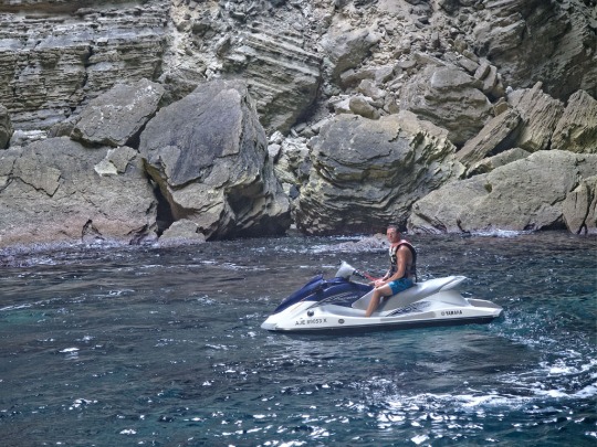 Jet skier in cave we travelled into near Bonifacio while sailing